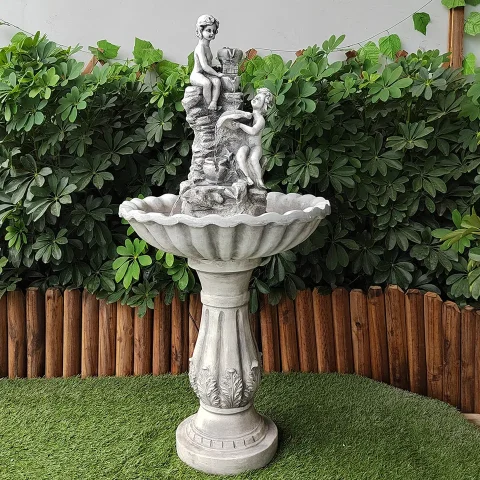 Boy and girl single layer flowing water fountain